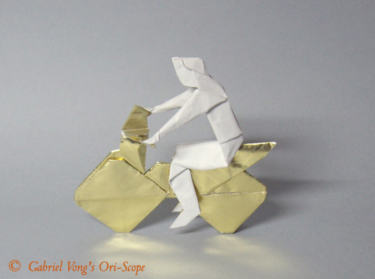 Origami Boy on motorscooter by Neal Elias on giladorigami.com