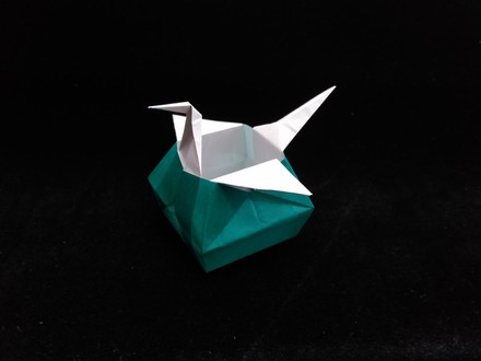 Origami Crane-shaped receptacle by Yamanashi Akiko on giladorigami.com